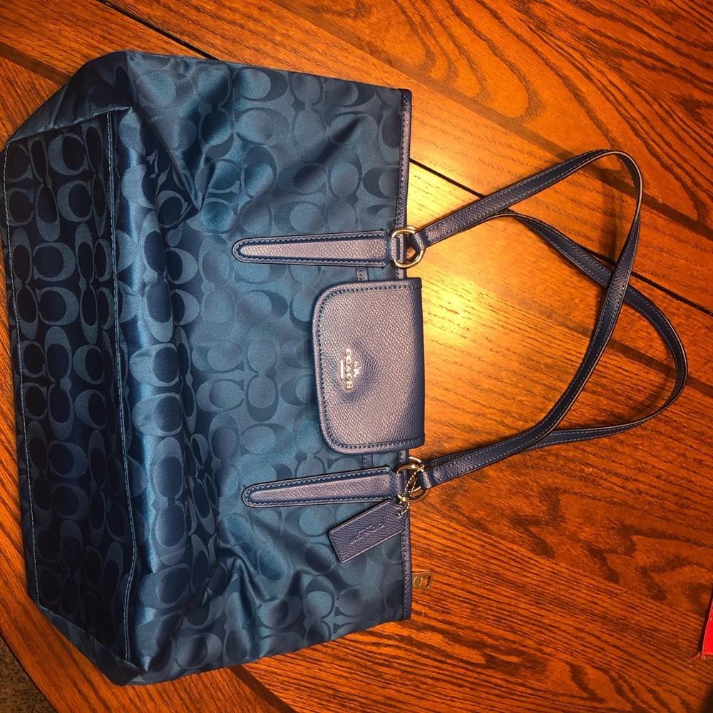 A pretty blue coach purse!